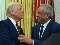 US Secretary of Health and Human Services Robert F. Kennedy Jr., shakes hands with US President Donald Trump after a swearing in ceremony in the Oval Office of the White House in Washington, DC, on February 13, 2025.