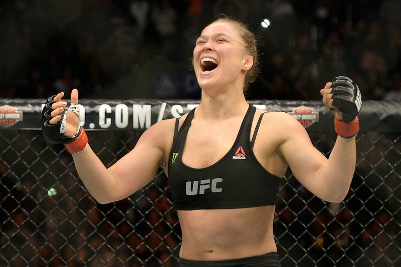 articles/2015/03/11/the-rise-of-rowdy-ronda-rousey-the-14-second-assassin/150310-stern-rousey2-embed_ws5s5k