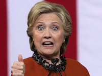 Democratic presidential candidate Hillary Clinton speaks during a campaign event at the Lawrence Joel Veterans Memorial Coliseum October 27, 2016 in Winston-Salem, North Carolina. U.S. first lady Michelle Obama joined Clinton for the first time to campaign for the presidential election.