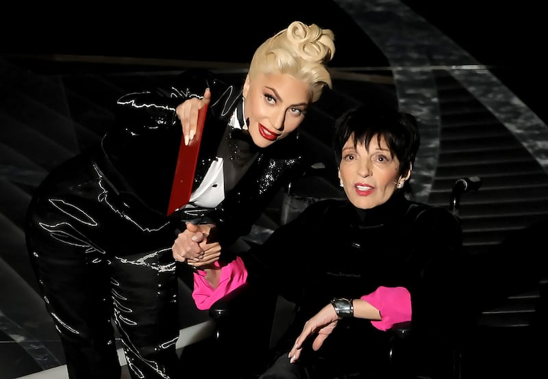 Lady Gaga and Liza Minnelli speak onstage during the 94th Annual Academy Awards in 2022