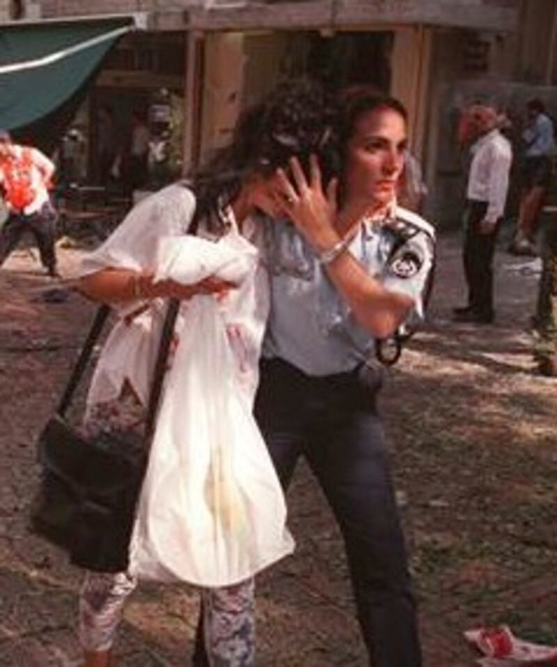 articles/2013/06/25/aipac-illustrates-current-threats-facing-israel-with-bombing-photo-from-1997/israeli-policewoman-cropped-openz_e5lsry