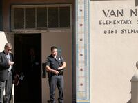 articles/2013/04/02/do-cops-with-guns-mean-safer-schools/130401-Shapiro-Guards-Schools-tease_gke54t