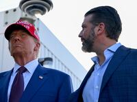 BROWNSVILLE, TEXAS - NOVEMBER 19: U.S. President-elect Donald Trump and his son Donald Trump Jr. attend the launch of the sixth test flight of the SpaceX Starship rocket on November 19, 2024 in Brownsville, Texas. SpaceX’s billionaire owner, Elon Musk, a Trump confidante, has been tapped to lead the new Department of Government Efficiency alongside former presidential candidate Vivek Ramaswamy. (Photo by Brandon Bell/Getty Images)