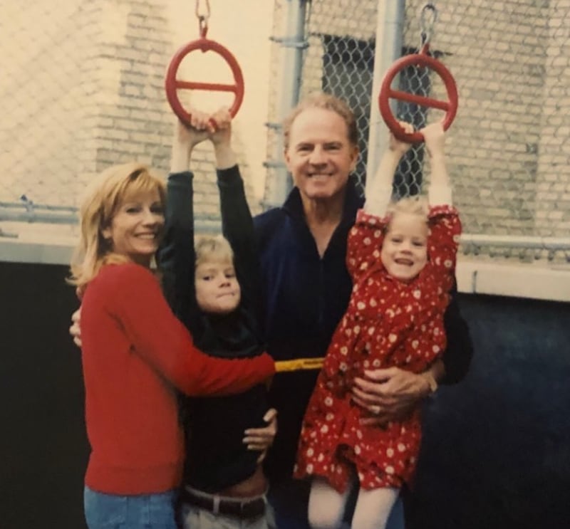 Kathie Lee Grifford and her late husband, Frank Gifford, pose in a family photo with their two children in a post on Cassidy Grifford’s Instagram.