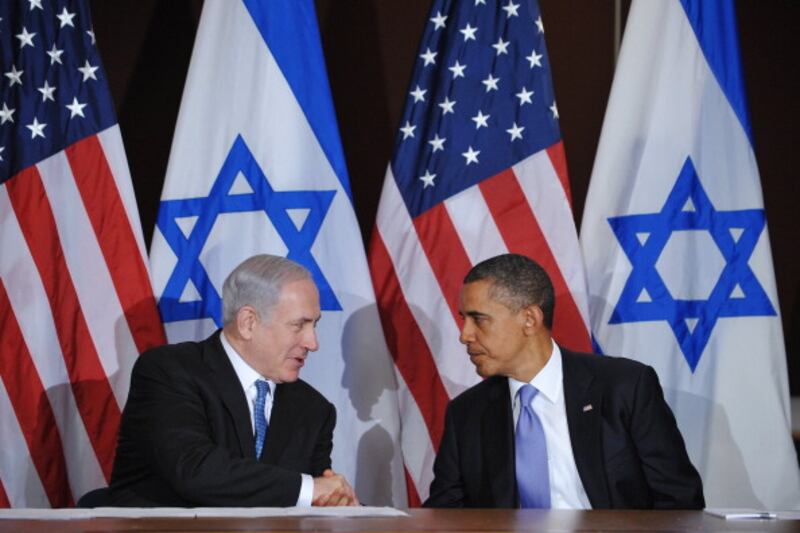 articles/2012/10/03/who-froze-the-peace-process/obama-bibi-flags-openz_otgrbe