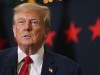 Republican presidential candidate and former U.S. President Donald Trump looks on .