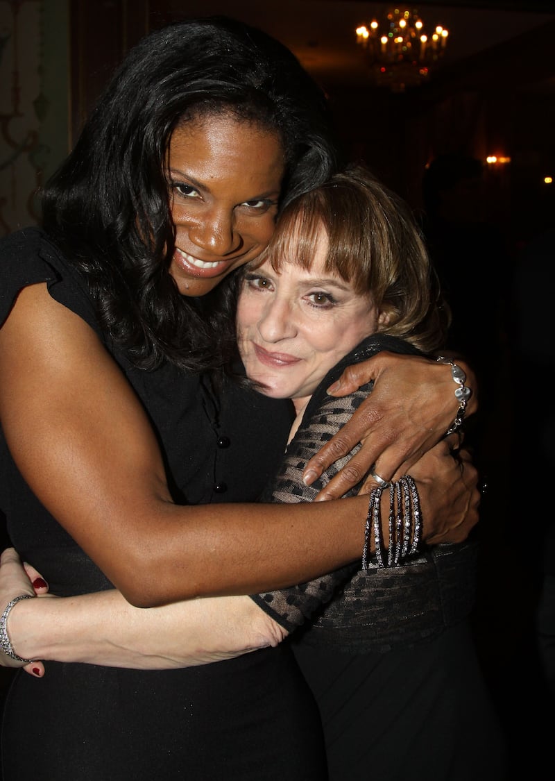 Audra McDonald and Patti LuPone pose at the Drama League's 27th Annual All-Star Benefit Gala honoring Patti LuPone at The Pierre Hotel on February 7, 2011 in New York City. (Photo by Bruce Glikas/FilmMagic)