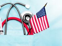 A photo illustration showing a doctors pocket with an American flag.