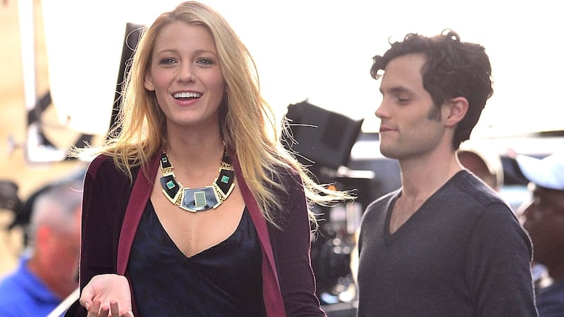 Blake Lively and Penn Badgley on the set of Gossip Girl.