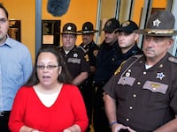 articles/2015/09/14/how-kim-davis-violated-the-first-amendment/150914-takei-davis-tease_huxpom