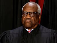 U.S. Supreme Court Associate Justice Clarence Thomas poses during a group portrait at the Supreme Court in Washington, U.S., October 7, 2022.