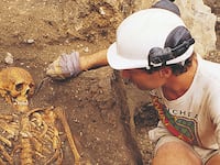 articles/2014/11/14/knowing-where-the-bodies-are-buried-an-excerpt-from-lives-in-ruins/141113-johnson-bones-tease_gtumpk