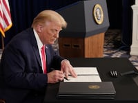 2020-08-08T205224Z_1810378674_RC2W9I9WHO78_RTRMADP_3_USA-TRUMP_rb5ezk