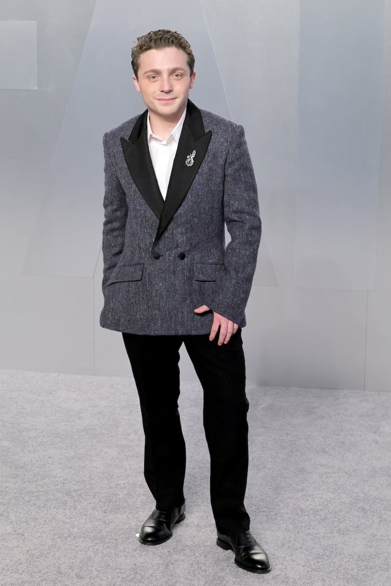 Jake Shane, wearing a charcoal-gray suit jacket and black pants, attends the 2026 Vanity Fair Oscar Party hosted by Mark Guiducci at the Los Angeles County Museum of Art on March 15, 2026, in Los Angeles, California.
