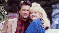 While shooting the movie "Overboard", actors Goldie Hawn and Kurt Russell pose for a portrait in October 1987 in Fort Bragg, California.