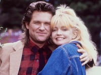While shooting the movie "Overboard", actors Goldie Hawn and Kurt Russell pose for a portrait in October 1987 in Fort Bragg, California.