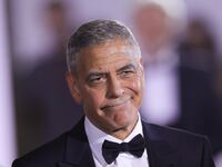 George Clooney on red carpet in tux