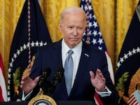 Joe Biden speaks to reporters during a press conference.
