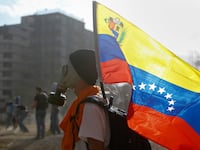 articles/2014/03/06/castro-visit-causes-catastrophic-muttering-in-caracas/140305-rodriguez-caracas-tease_gomytf