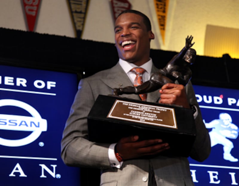 articles/2010/12/12/heisman-hypocrisy-cam-newton-his-father-cecil-and-the-ncaa/bissinger-newton_146803_btmdjw
