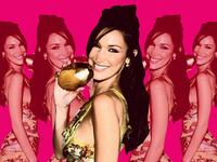 A photo illustration showing Bella Hadid holding her new perfume called Orebella.