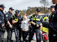Swedish climate activist Greta Thunberg is arrested during a climate march against fossil subsidies near the highway A12 in the Hague, on April 6, 2024.