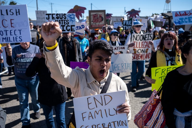 Protests against Immigration and Customs Enforcement as they march toward the South Texas Family Residential Center.