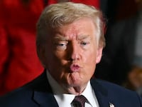 US President Donald Trump gestures to the crowd after speaking at a political rally in Rocky Mount, North Carolina on December 19, 2025.