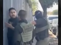 Gavidia confronted by ICE agents.