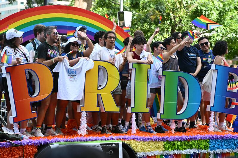 Participants ride on a float during the annual Capital Pride Parade in Washington, DC, on June 8, 2024. (Photo by Mandel NGAN / AFP) (Photo by MANDEL NGAN/AFP via Getty Images)