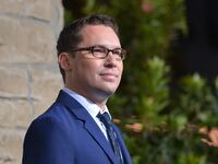 articles/2014/07/29/bryan-singer-agreed-to-settle-sex-abuse-lawsuit-for-100-000-but-insists-he-s-innocent/140729-teeman-singer-suit-tease_knsxjt