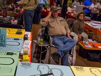 articles/2013/04/24/art-and-armor-piercing-rounds-family-businesses-and-angry-young-men/130423-gunshow-1_dyfbnw