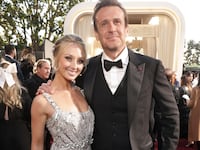 Jason Segel and Kayla Radomski at the 2024 Golden Globe Awards.