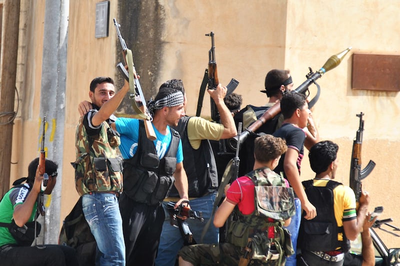 articles/2012/07/18/inside-the-syrian-bomb-plot/syria-rebels-paul_gufuvc
