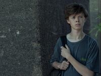 Image of Lucian Zanes in the woods in an episode of Full Circle