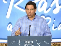 U.S. Republican presidential candidate and Florida Governor Ron DeSantis speaks at the \"Roast and Ride\" event.