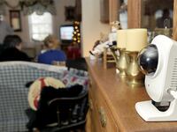 Fri. , Dec. 23, 2011. A remote camera is part of electronic devices used to monitor the home of Patty Gardner used by a support group called Full Circle America.