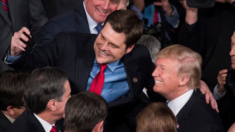 President Donald Trump takes a selfie with Rep. Matt Gaetz after the State of the Union address in 2018.