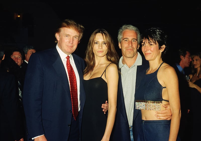 President Donald Trump is pictured with Jeffrey Epstein and their then girlfriends, including First Lady Melania Trump, in 2000.