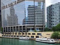 Kayakers on the Chicago River paddle toward Trump Tower in Chicago, Illinois, on Aug. 1, 2024.