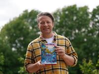 Jamie Oliver during a visit to Great Bradfords Junior School, in Braintree, Essex, as he launches his new book, Billy and the Epic Escape, on May 23, 2024.