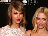 Taylor Swift and Jaime King hugging for. a photo