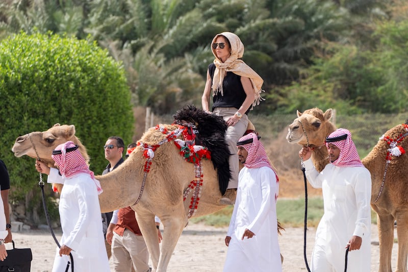 Kristi Noem rides a camel after a tour of Qal'at al-Bahrain Fort near Manama.