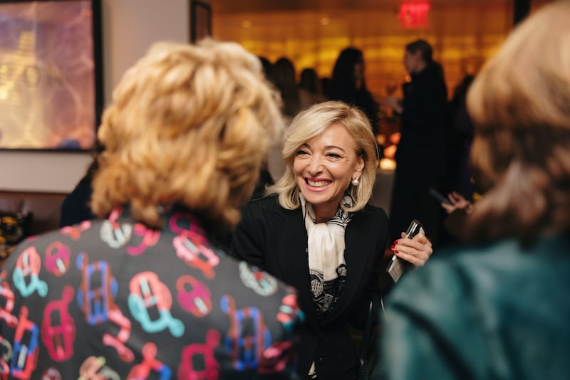 Federica Marchionni, CEO of Global Fashion Agenda, mingles with fellow guests at the Power 100 luncheon.