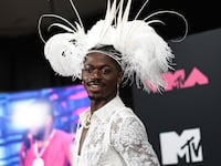 Lil Nas X poses in the press room at the 2023 MTV Video Music Awards at Prudential Center.