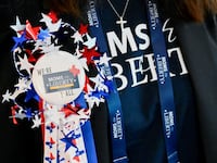 A badge worn by an attendee of the Moms for Liberty summit is seen at the Marriott Hotel in Philadelphia, Pennsylvania, U.S., June 30, 2023.