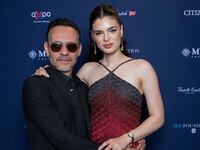 Marc Anthony and Nadia Ferreira.