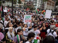 People attend a rally in support of Palestinians in the Gaza Strip at Bayfront Park in Miami, Florida.