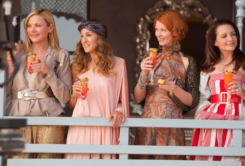 Kim Cattrall, Sarah Jessica Parker, Kristin Davis, and Cynthia Nixon in 'Sex and the City 2.' In one notable scene, Samantha Jones (portrayed by Cattrall) struggles with overwhelming hot flashes.