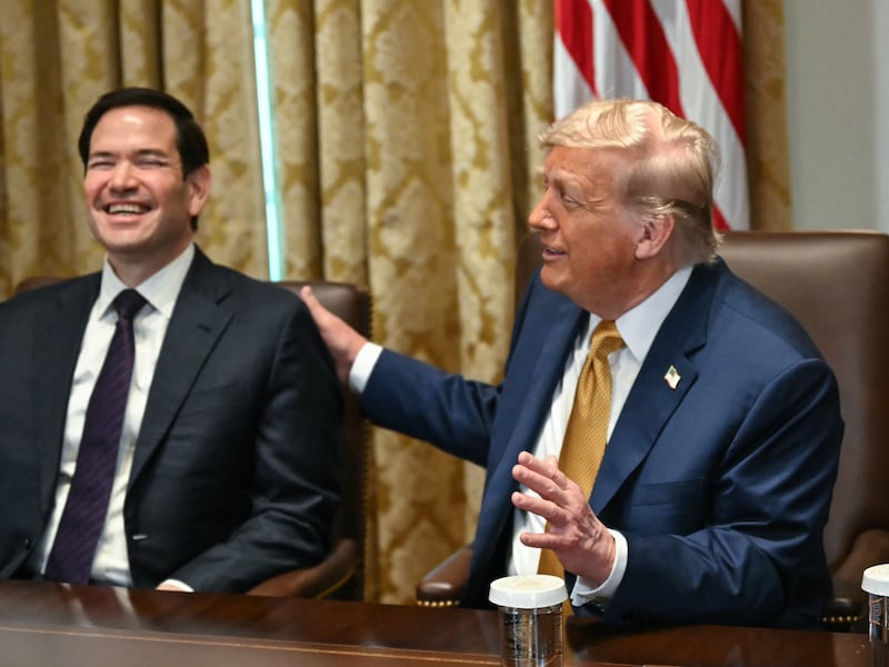US President Donald Trump pats Secretary of State Marco Rubio on the shoulder during a cabinet meeting in the Cabinet Room of the White House in Washington, DC, on July 8, 2025. (Photo by ANDREW CABALLERO-REYNOLDS / AFP) (Photo by ANDREW CABALLERO-REYNOLDS/AFP via Getty Images)